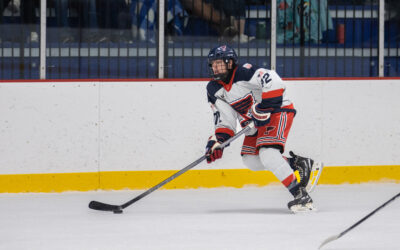 Jr. Blues Square Off Against the Woodsmen