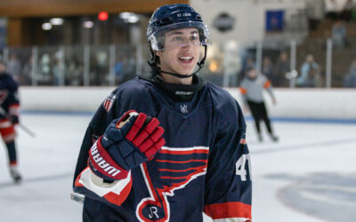 Jr. Blues Split on the Road with the Mustangs